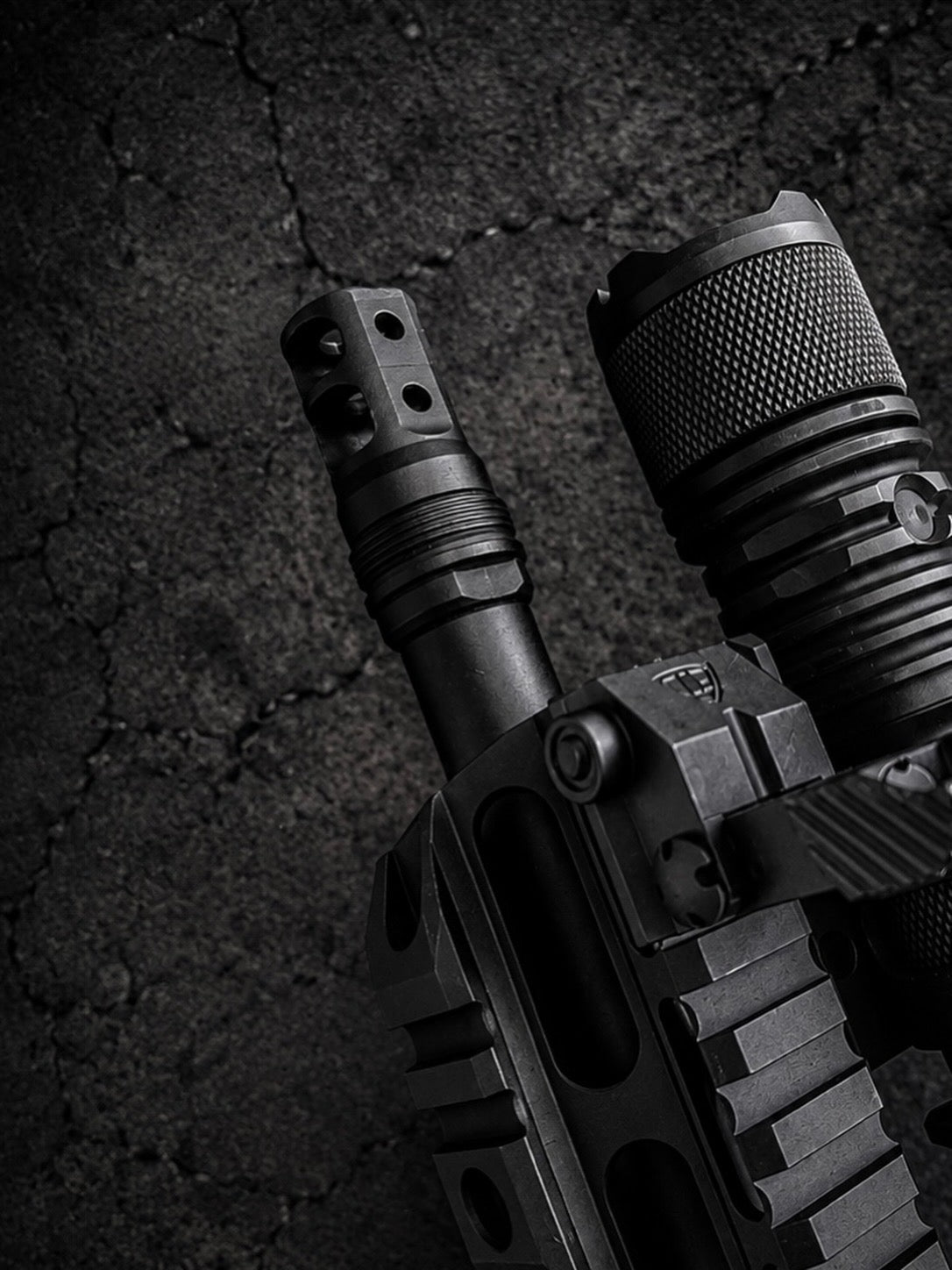PsychWard Labs Hammer 1/2x28 muzzle brake and Plan B-compatible suppressor mount installed on an AR-15 platform.