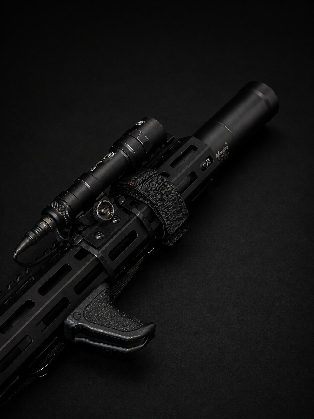 PsychWard Labs Hammer 1/2x28 muzzle brake and Plan B-compatible suppressor mount shown with a suppressor installed.